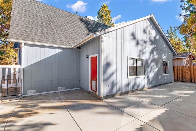 back of property featuring a patio