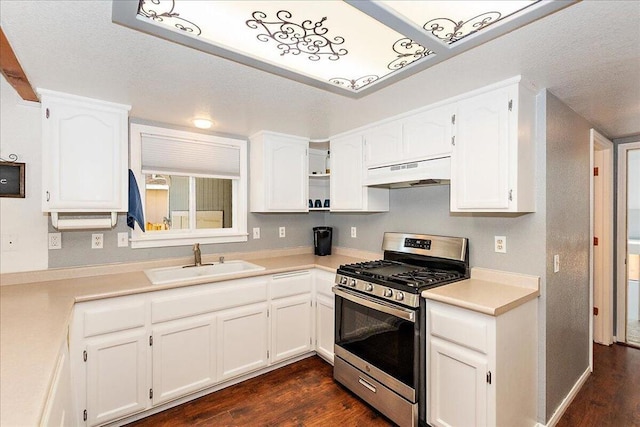 kitchen with sink, white cabinetry, stainless steel gas range, and custom exhaust hood