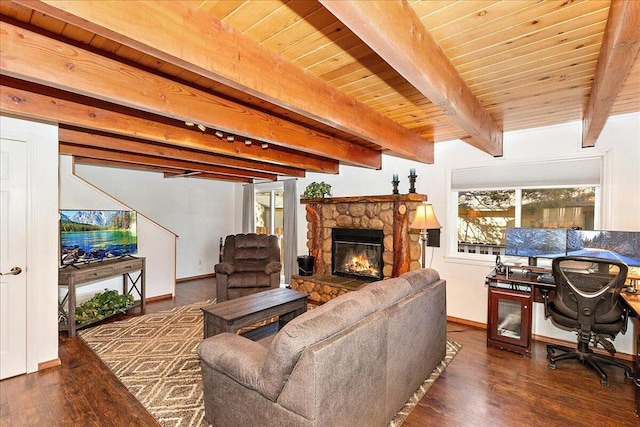 living room featuring wooden ceiling, dark hardwood / wood-style floors, a stone fireplace, and beamed ceiling