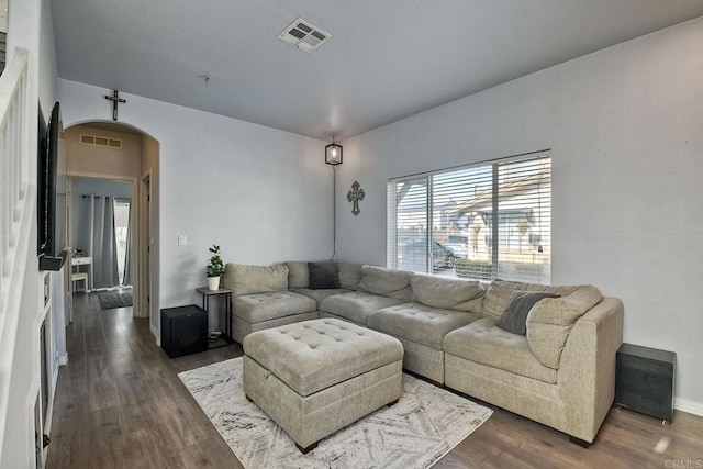 living room featuring dark hardwood / wood-style floors