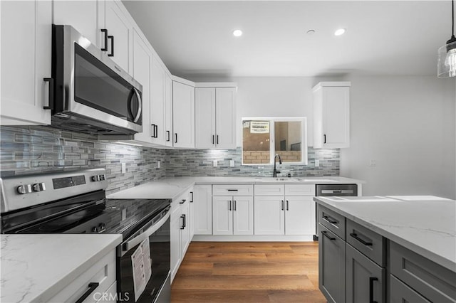 kitchen with white cabinets and stainless steel appliances