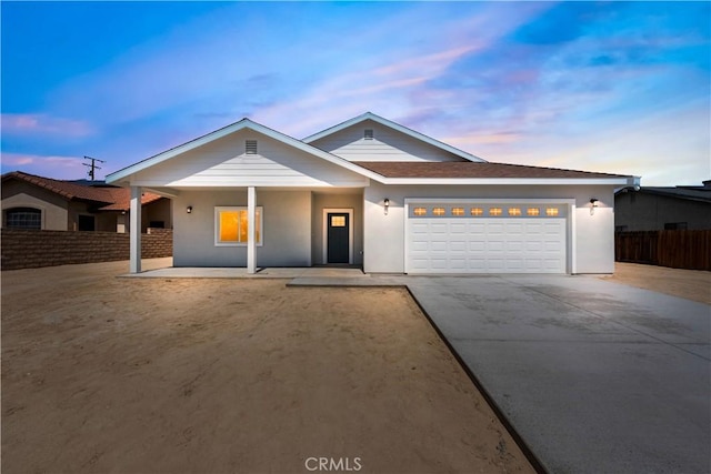 ranch-style house with a garage