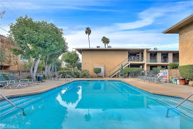 view of pool featuring a patio