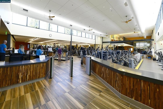 welcome area featuring ceiling fan