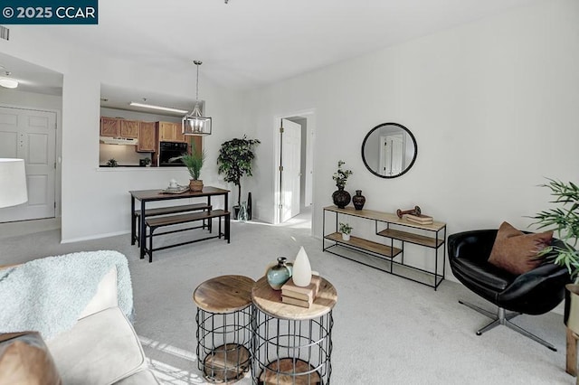 living area with light carpet