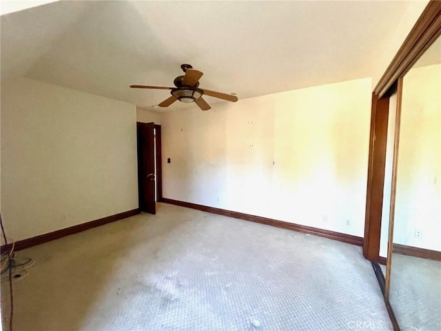 unfurnished bedroom featuring ceiling fan