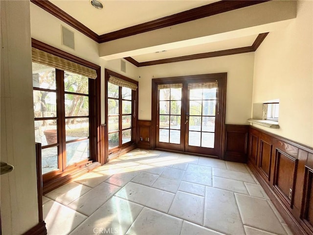 doorway to outside with french doors and crown molding