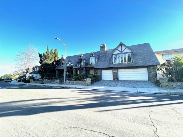 view of front of property featuring a garage