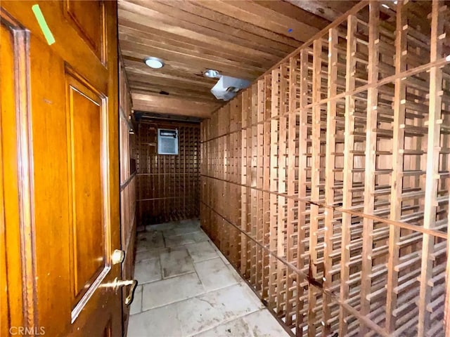 wine area with wooden ceiling