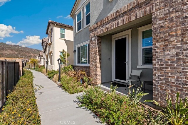 property entrance featuring a mountain view