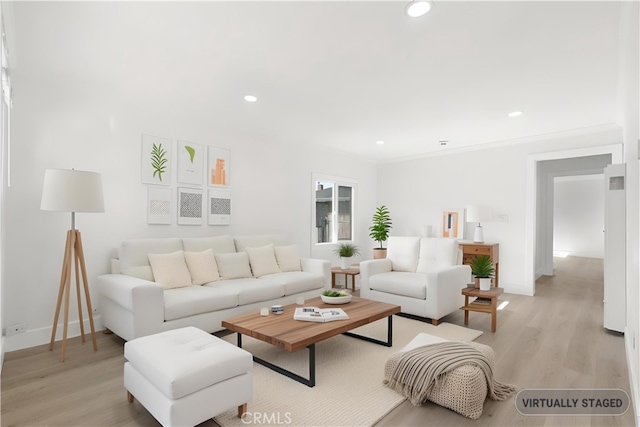 living room with light hardwood / wood-style floors