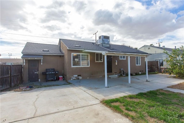 back of house featuring a patio area and central AC