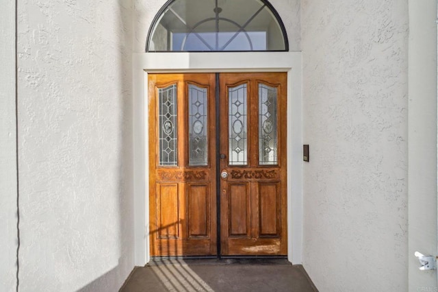 doorway to property with french doors