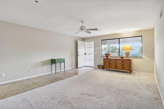 interior space featuring ceiling fan