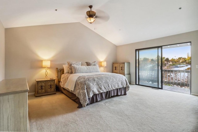 bedroom featuring ceiling fan, lofted ceiling, access to exterior, and light colored carpet