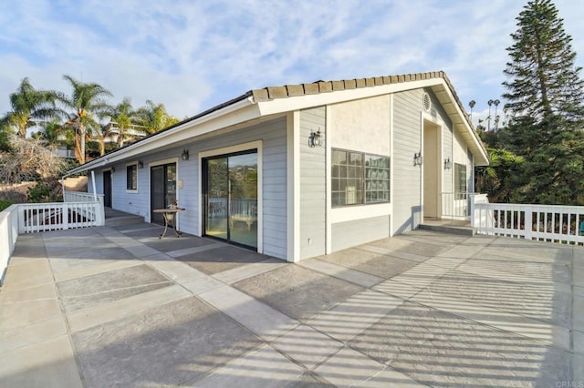 exterior space with a wooden deck