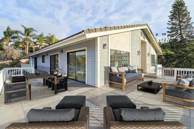 exterior space featuring an outdoor living space