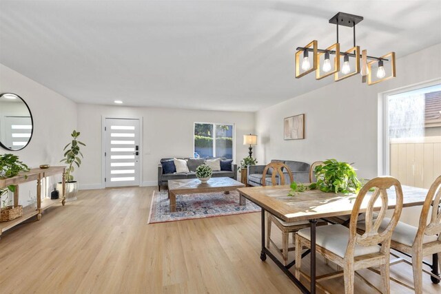 dining space featuring light hardwood / wood-style floors