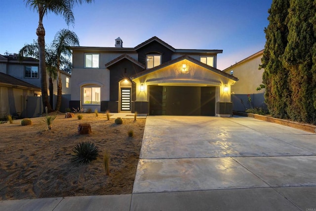 view of front of property featuring a garage