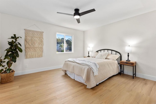 bedroom featuring ceiling fan and light hardwood / wood-style floors