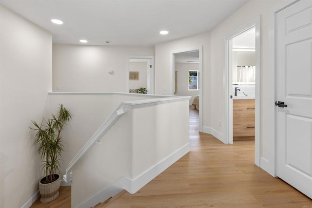 hall featuring light hardwood / wood-style floors