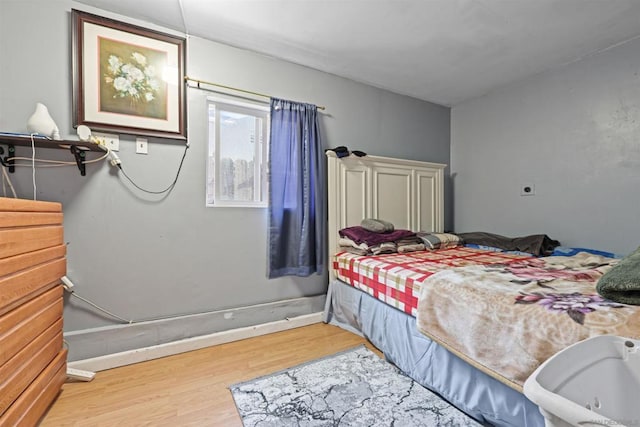 bedroom featuring light hardwood / wood-style flooring