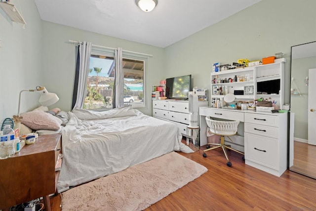 bedroom featuring light wood-type flooring