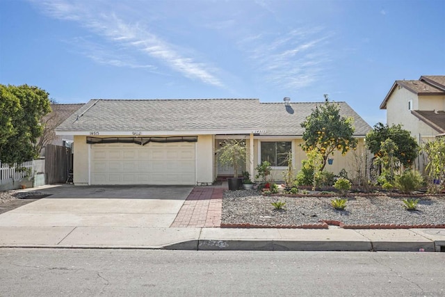 ranch-style house featuring a garage