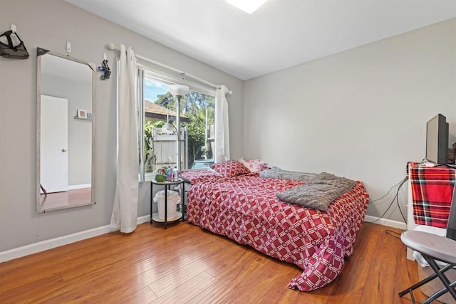 bedroom featuring wood-type flooring