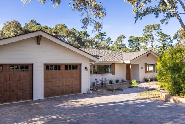 single story home with a garage