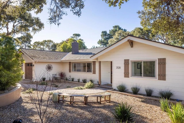 single story home featuring a garage