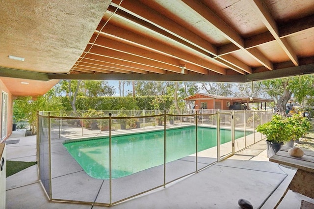 view of pool featuring a patio area