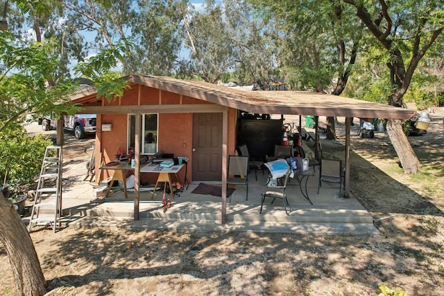 exterior space with a patio area