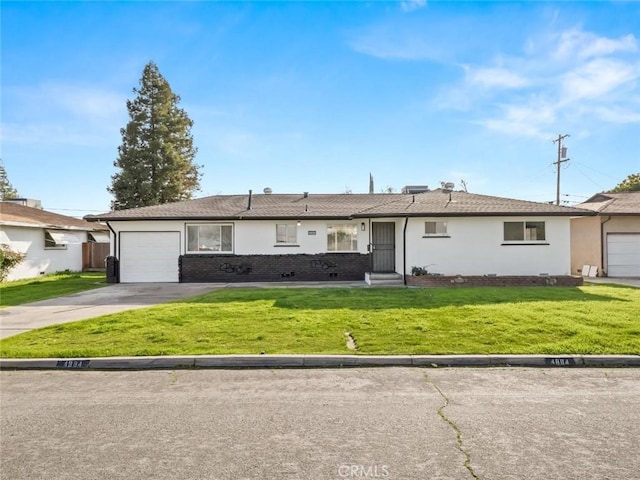 single story home featuring a front yard and a garage