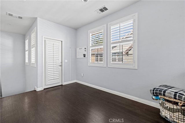 foyer featuring dark hardwood / wood-style floors