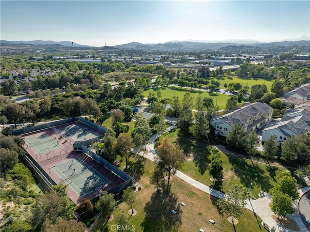 birds eye view of property with a mountain view