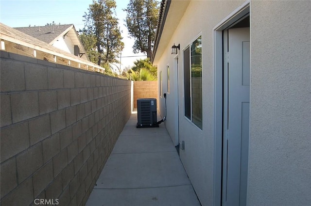 view of property exterior with cooling unit