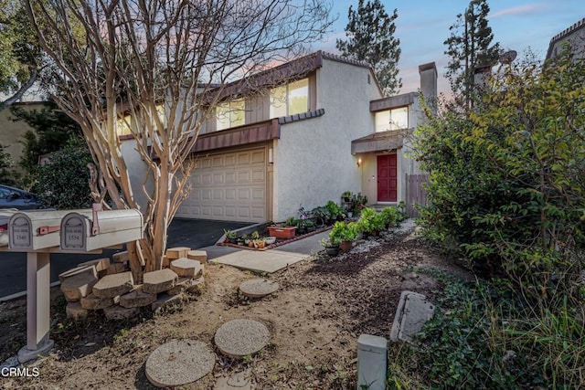 view of front of home with a garage