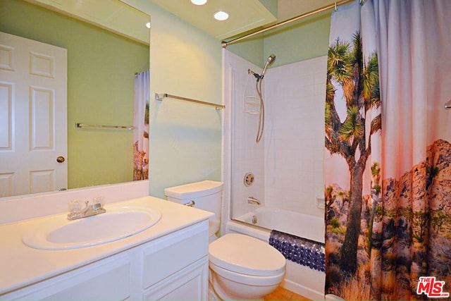 full bathroom featuring toilet, vanity, and shower / bathtub combination with curtain