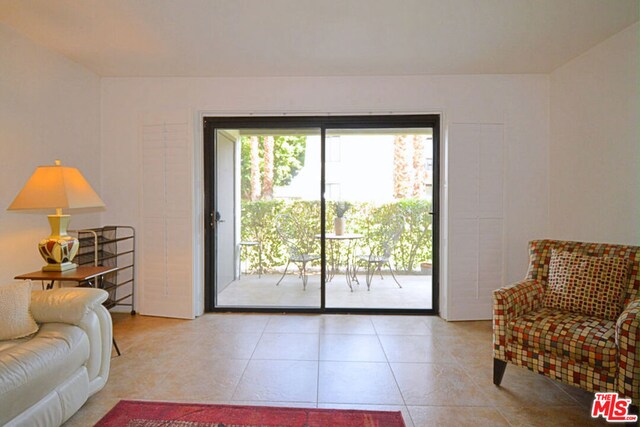 living room featuring light tile patterned flooring