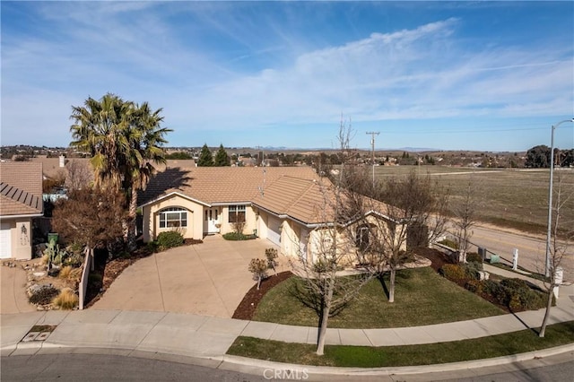 ranch-style home featuring a garage