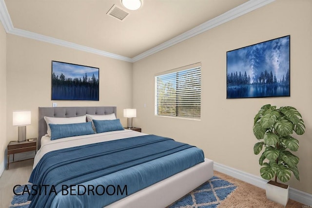 carpeted bedroom featuring crown molding