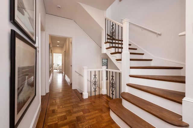 stairs with parquet flooring