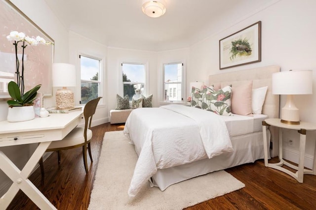 bedroom featuring dark hardwood / wood-style floors