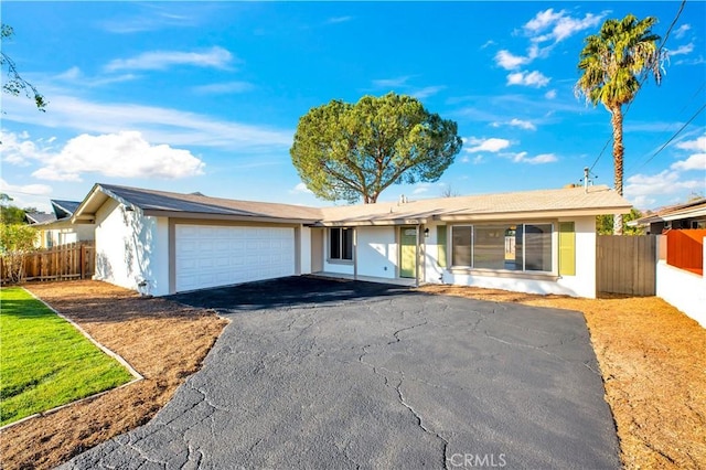 single story home featuring a garage