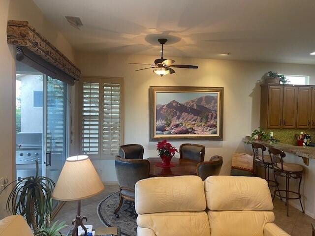 living room with ceiling fan