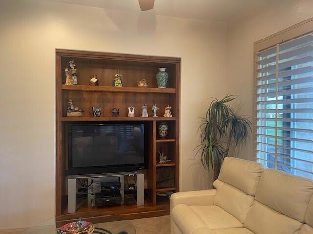 living room with tile patterned floors