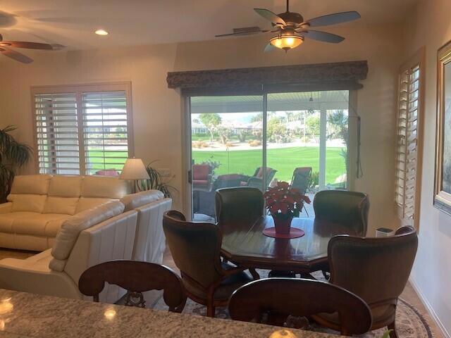 dining area featuring ceiling fan