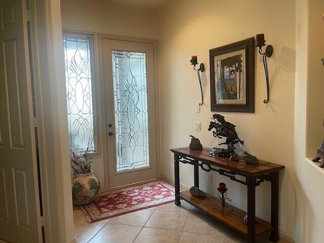 view of tiled entrance foyer