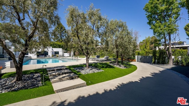 view of pool with a patio